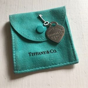 Authentic Tiffany & Co heart and key pendant.